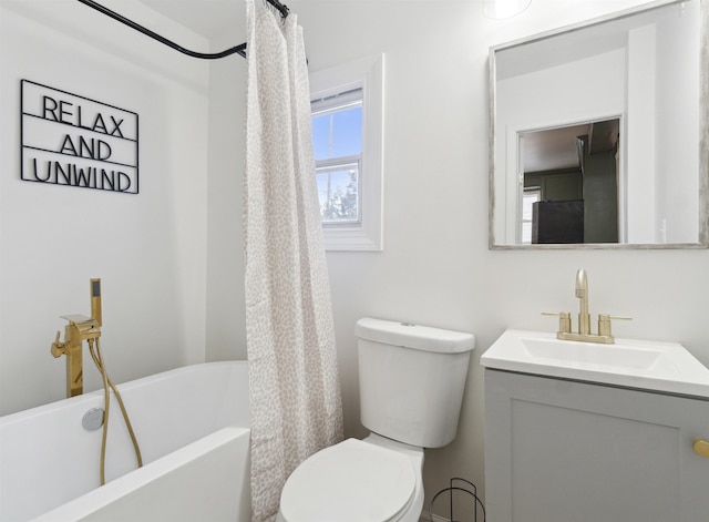 full bathroom featuring vanity and toilet