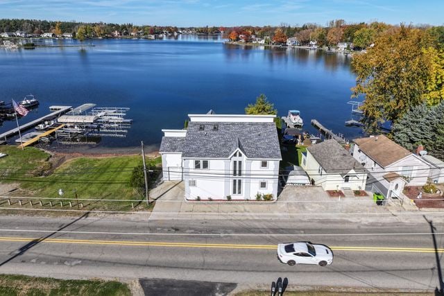 drone / aerial view with a water view