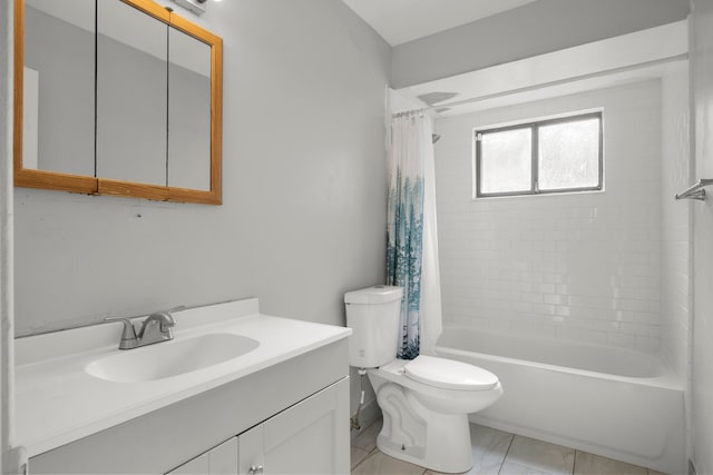 full bath with vanity, toilet, and shower / bath combo with shower curtain