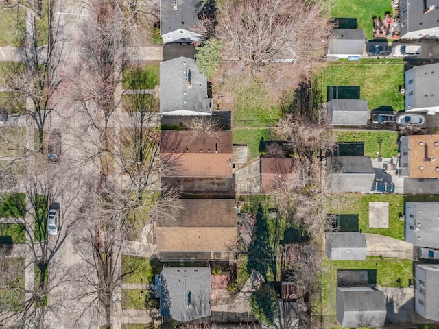 birds eye view of property with a residential view