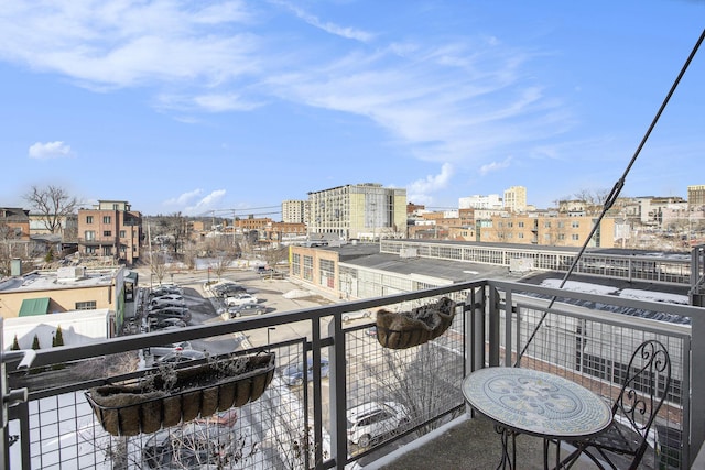 balcony featuring a city view