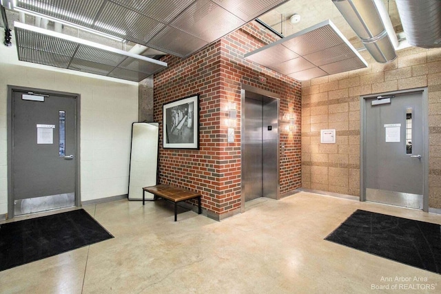 doorway to property featuring elevator