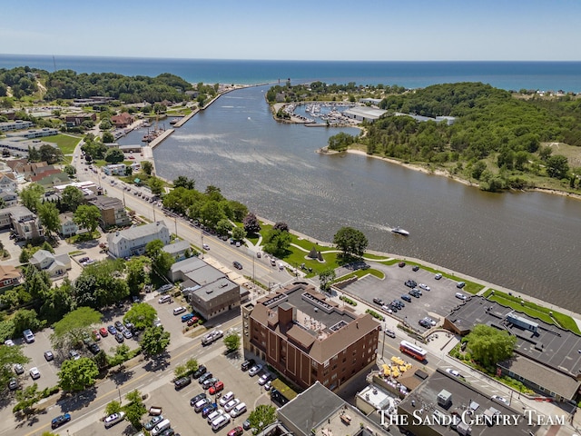 birds eye view of property featuring a water view