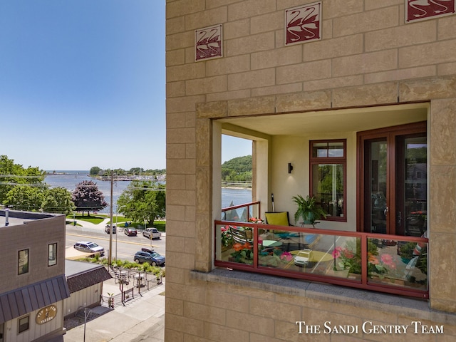 property entrance with a water view