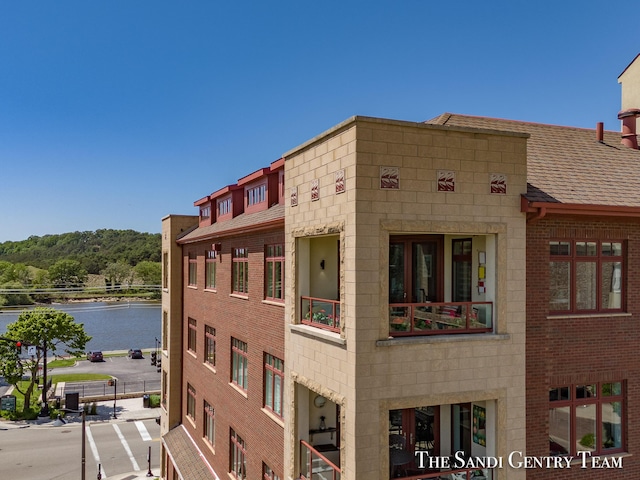 view of building exterior featuring a water view