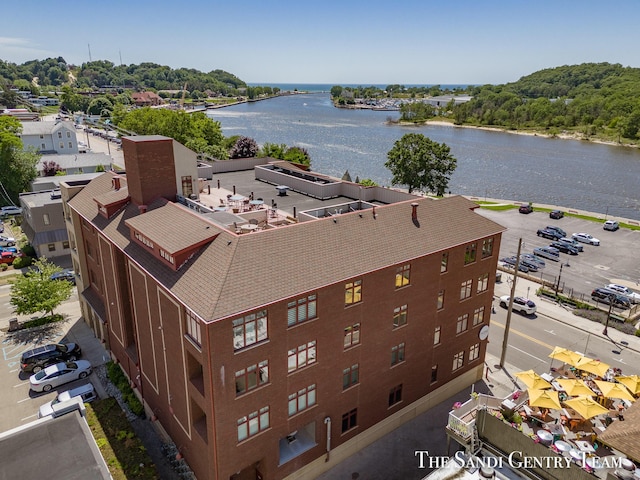 drone / aerial view with a water view