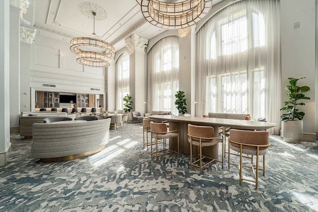 interior space with a notable chandelier and visible vents