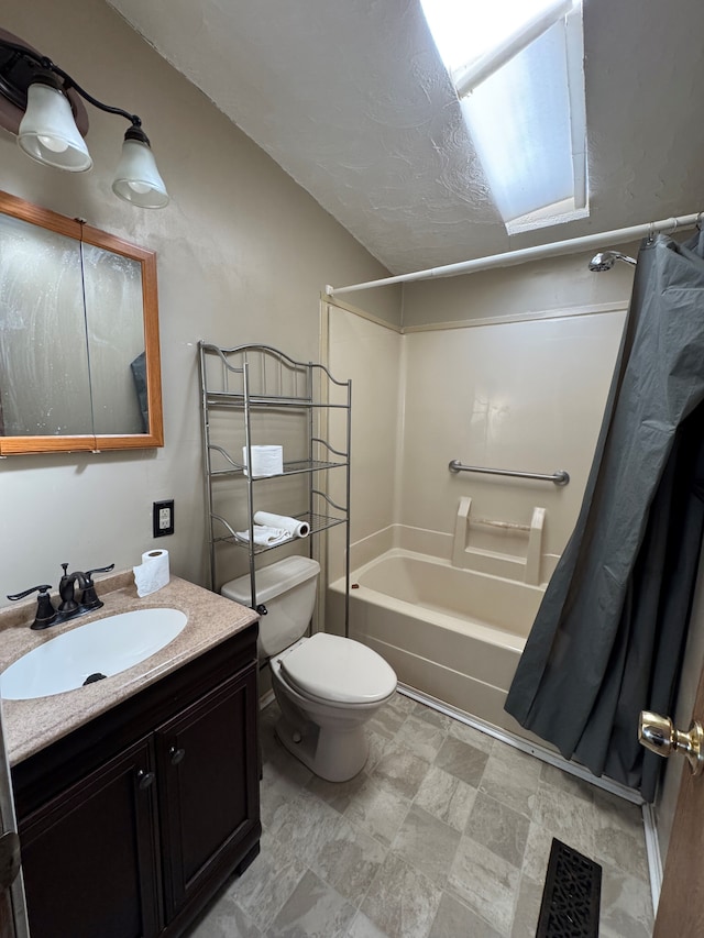 bathroom featuring visible vents, toilet, lofted ceiling, shower / bath combination with curtain, and vanity