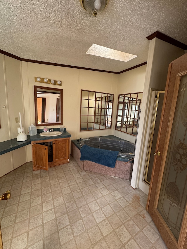 full bathroom featuring crown molding, vanity, a bath, and tile patterned floors