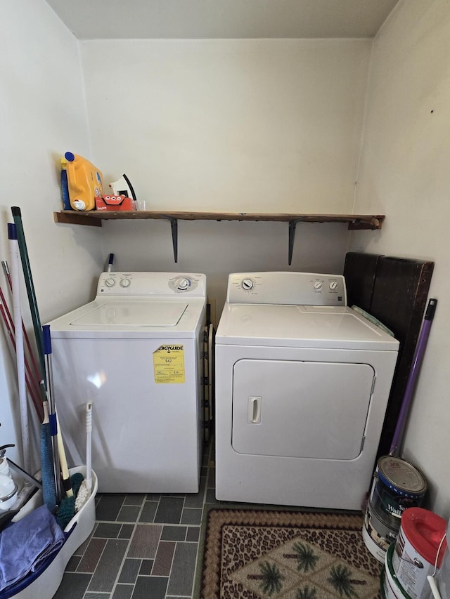 laundry area featuring laundry area and washing machine and clothes dryer