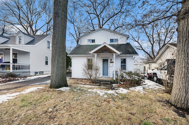 view of front of house featuring a shingled roof