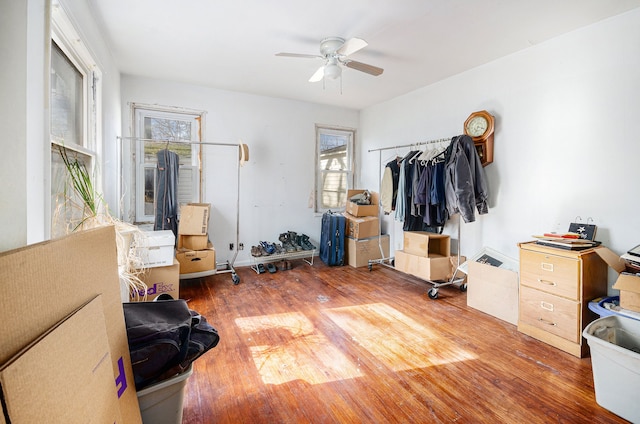 bedroom with ceiling fan and wood finished floors