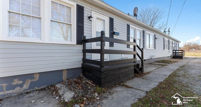 view of exterior entry featuring crawl space