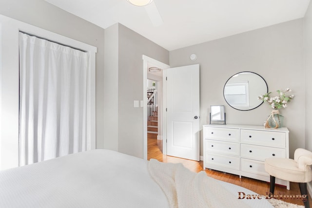 bedroom featuring a ceiling fan and light wood-style floors