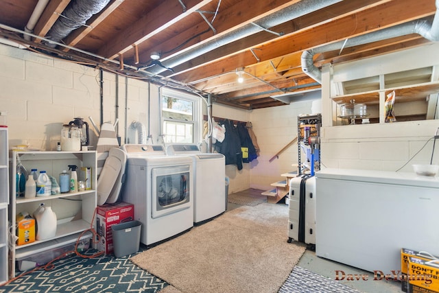 washroom with laundry area and washer and dryer