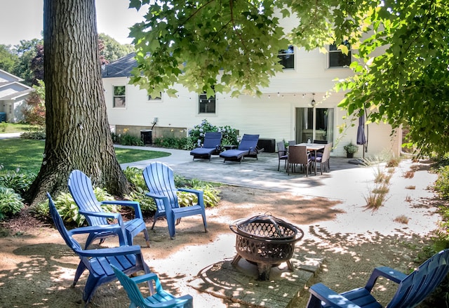 view of patio / terrace with a fire pit