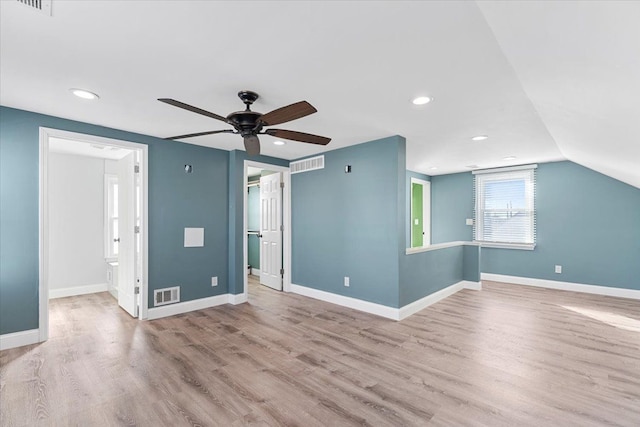 interior space with recessed lighting, light wood-type flooring, visible vents, and baseboards