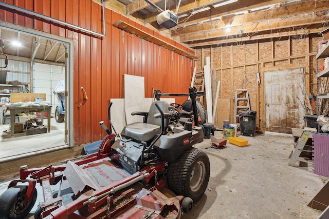 garage featuring a workshop area and a garage door opener