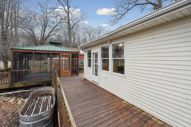 wooden terrace with a sunroom