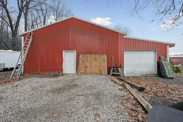 exterior space with gravel driveway