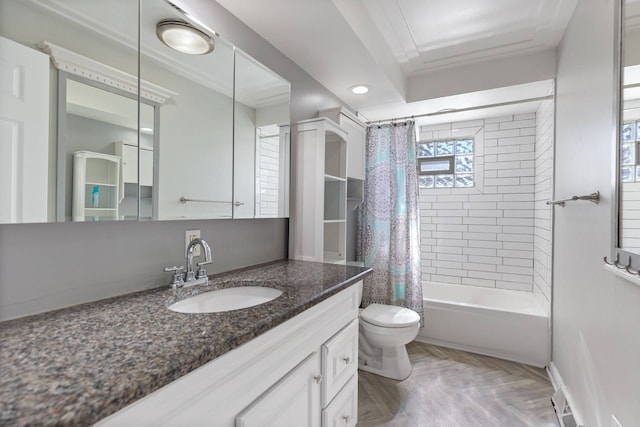 full bathroom featuring toilet, ornamental molding, shower / bath combo with shower curtain, and vanity