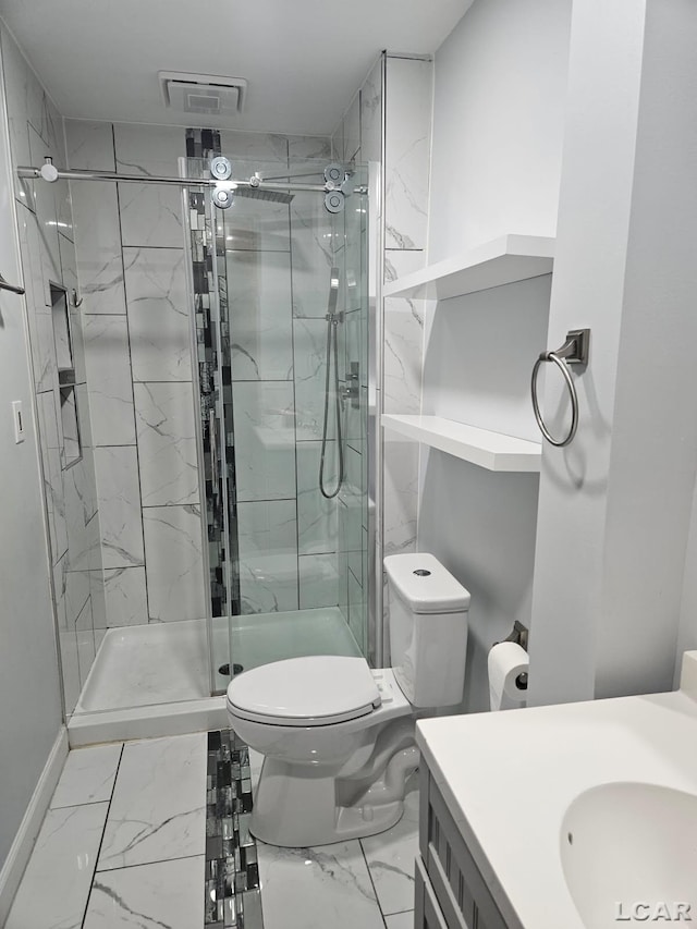 bathroom featuring toilet, visible vents, vanity, marble finish floor, and a shower stall