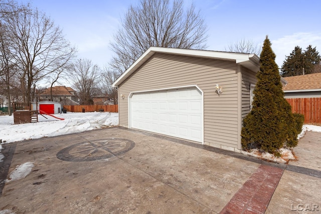 detached garage with fence