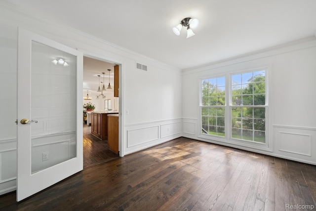 1869 Midchester Dr, West Bloomfield, MI 48324 - empty room with ornamental molding, dark wood-style floors, a wainscoted wall, and a decorative wall