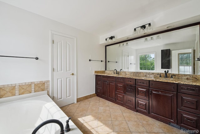 1869 Midchester Dr, West Bloomfield, MI 48324 - full bathroom with double vanity, a bath, tile patterned flooring, and baseboards