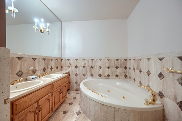 bathroom featuring tile walls, a sink, a jetted tub, and double vanity