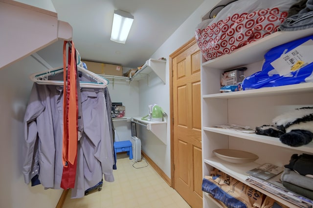 spacious closet featuring light floors