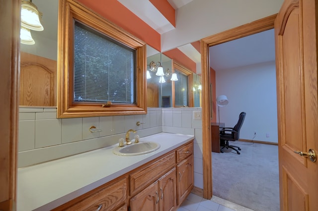 bathroom with tasteful backsplash, vanity, and tile walls