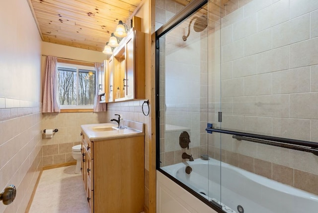 full bath featuring tile walls, toilet, combined bath / shower with glass door, vanity, and wooden ceiling