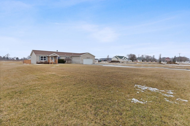 view of yard with a garage