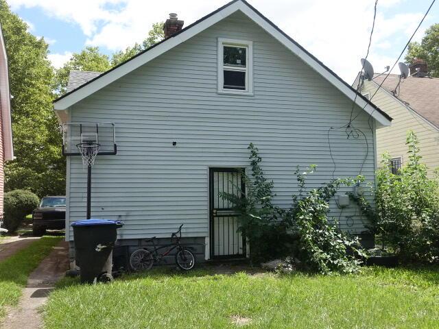 view of property exterior featuring a chimney