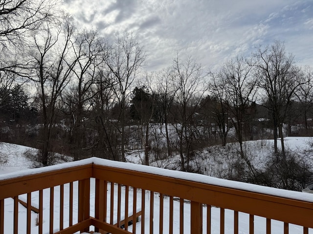 view of snow covered deck