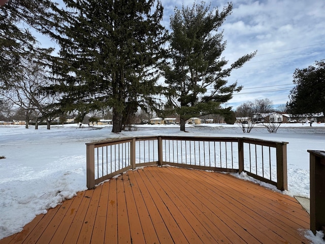 view of snow covered deck