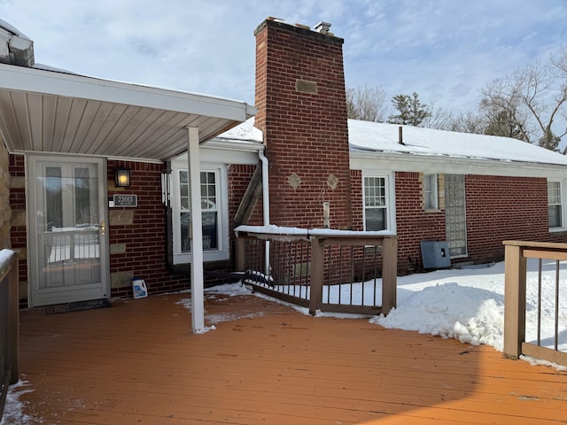 view of snow covered deck