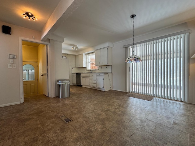 kitchen featuring a sink, visible vents, white cabinetry, dishwasher, and decorative light fixtures