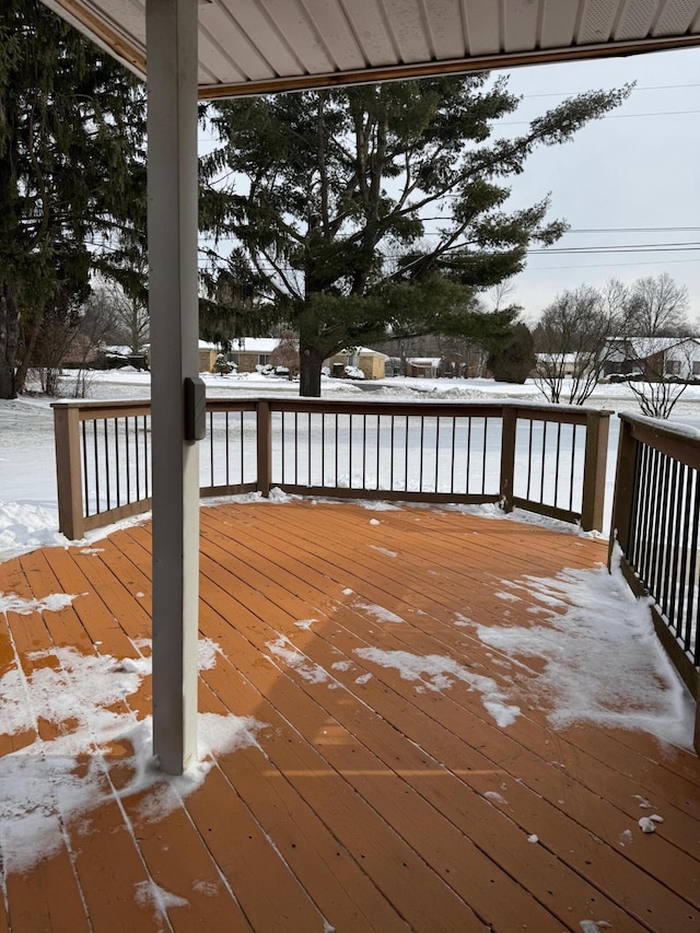 view of snow covered deck