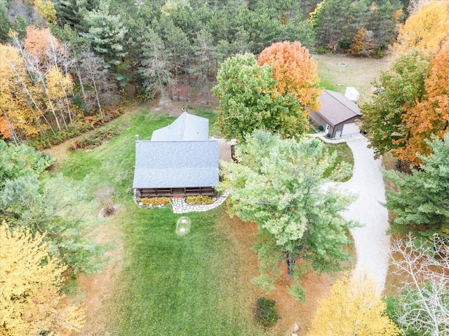 bird's eye view featuring a forest view