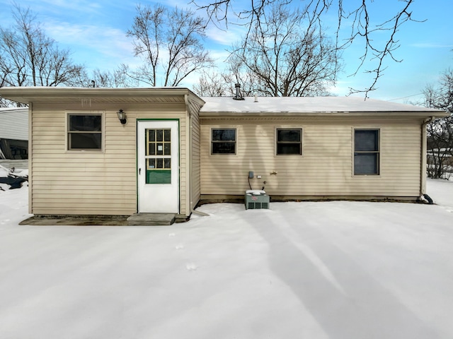 view of snow covered house