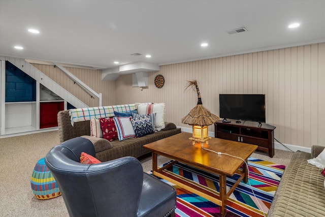 living area with stairway, visible vents, and recessed lighting