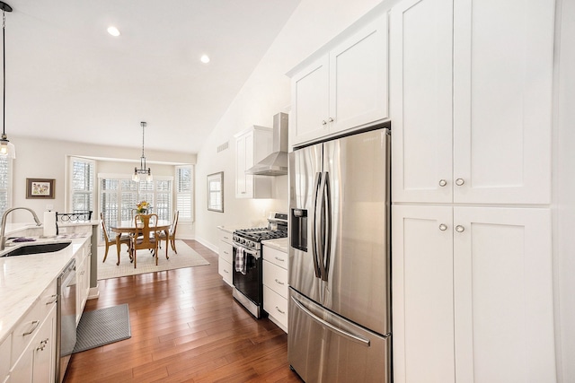 12341 Twin Brook Dr, Romeo, MI 48065 - kitchen featuring a sink, dark wood-style floors, wall chimney range hood, white cabinets, and appliances with stainless steel finishes