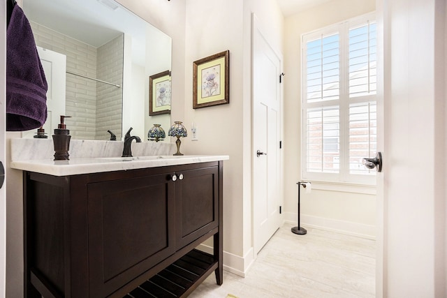 12341 Twin Brook Dr, Romeo, MI 48065 - full bath featuring baseboards, wood finished floors, and vanity
