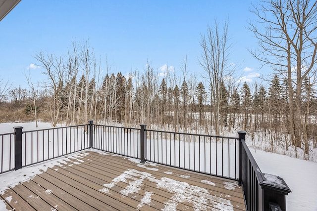 view of snow covered deck