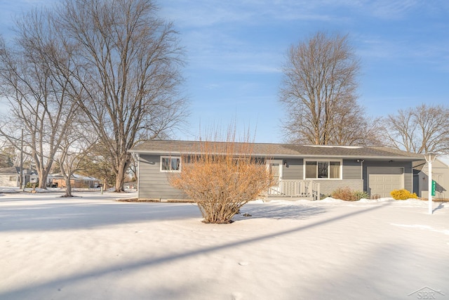 ranch-style house featuring an attached garage