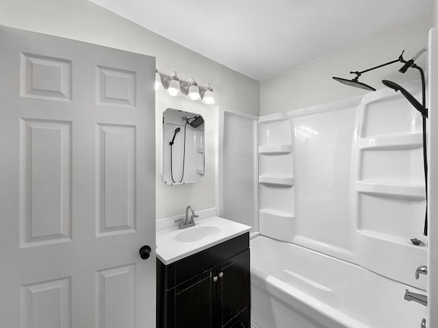 bathroom with shower / washtub combination and vanity