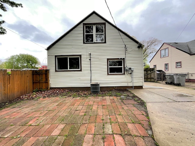 23432 Cayuga Ave, Hazel Park, MI 48030 - back of house with cooling unit, a patio, and fence