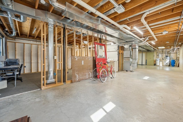 unfinished basement featuring heating unit